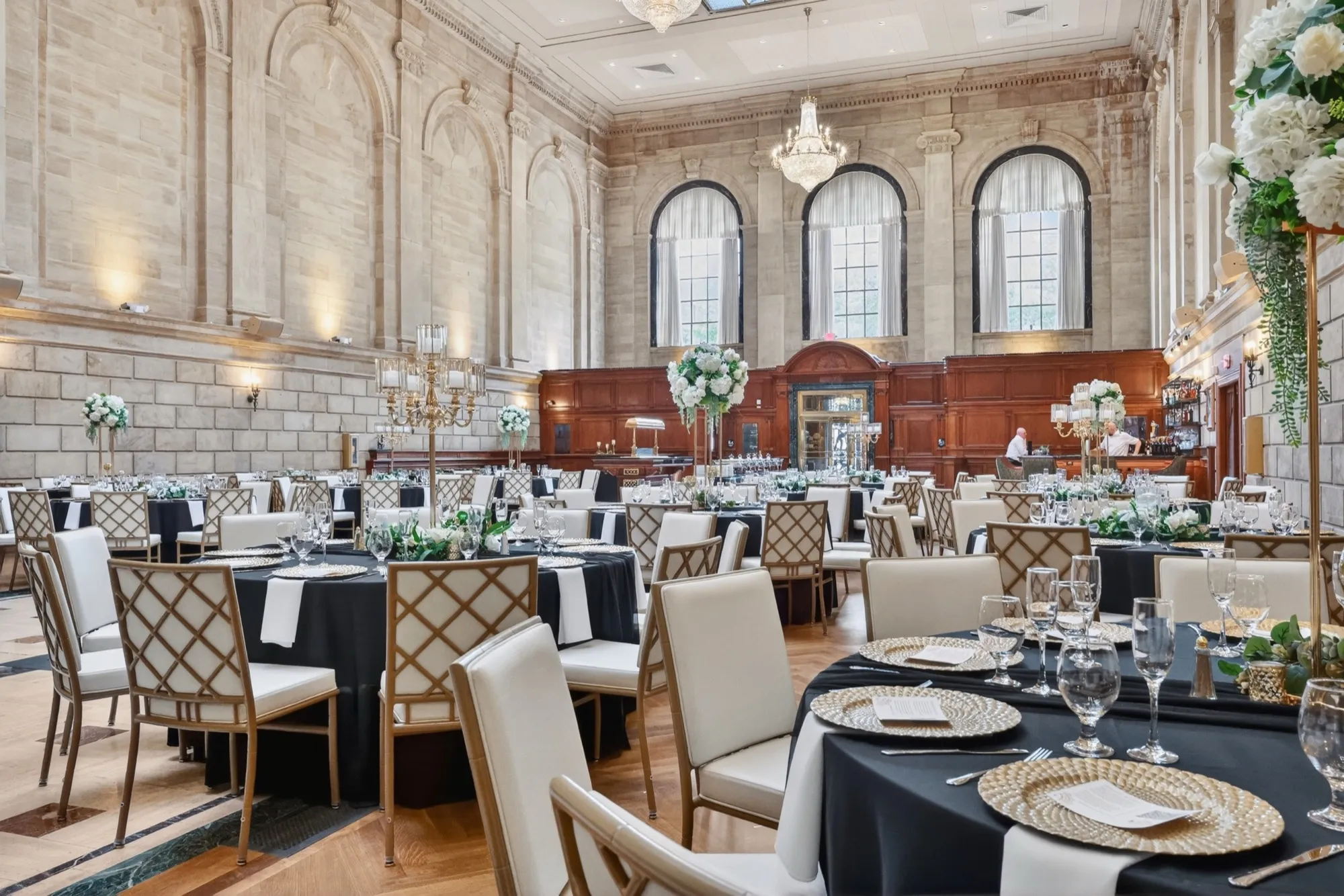 A wedding reception beneath the vaulted ceiling of the Vault Room