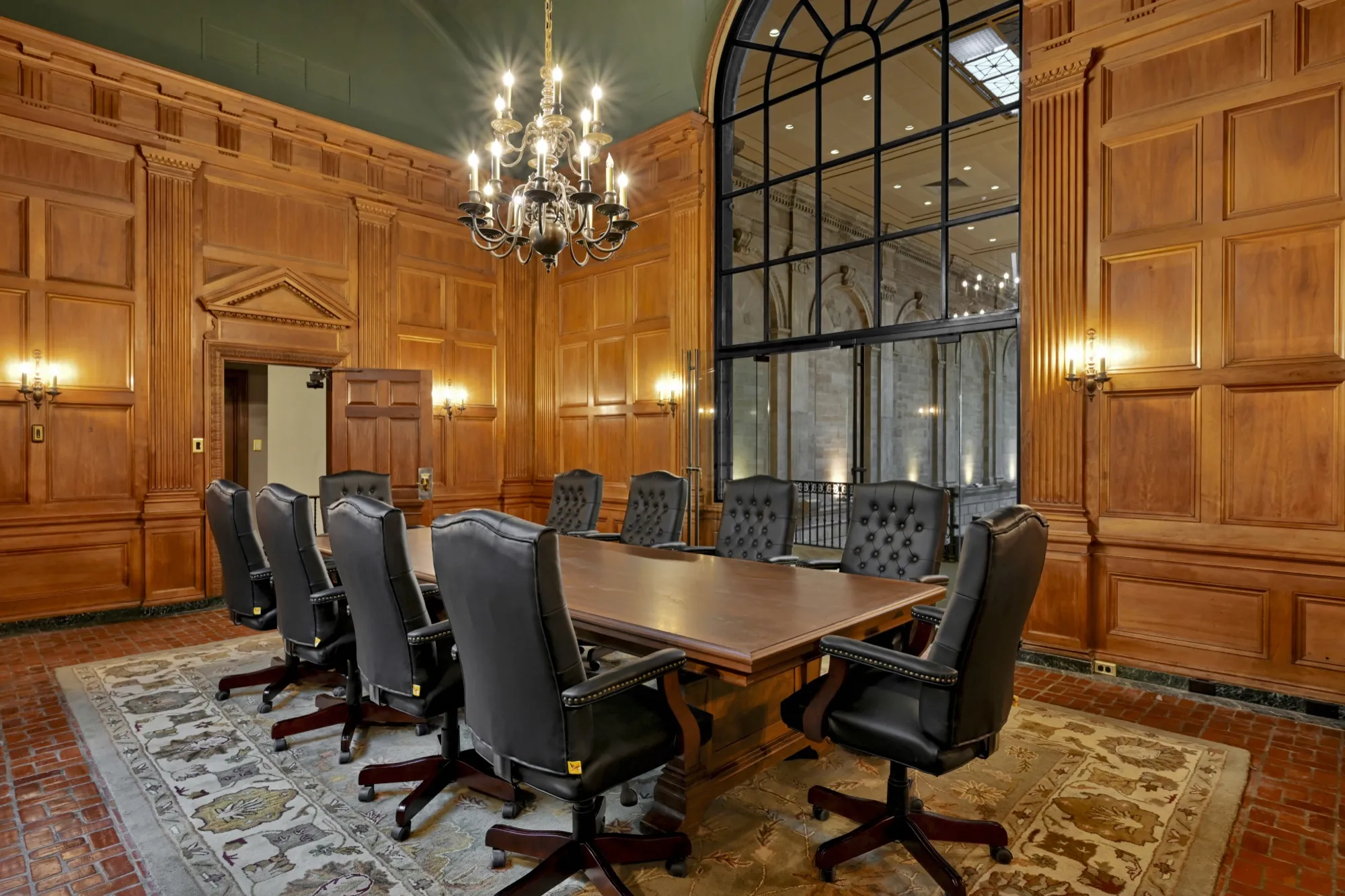 The wood-paneled Boardroom at The Miners 1928, set for an executive meeting