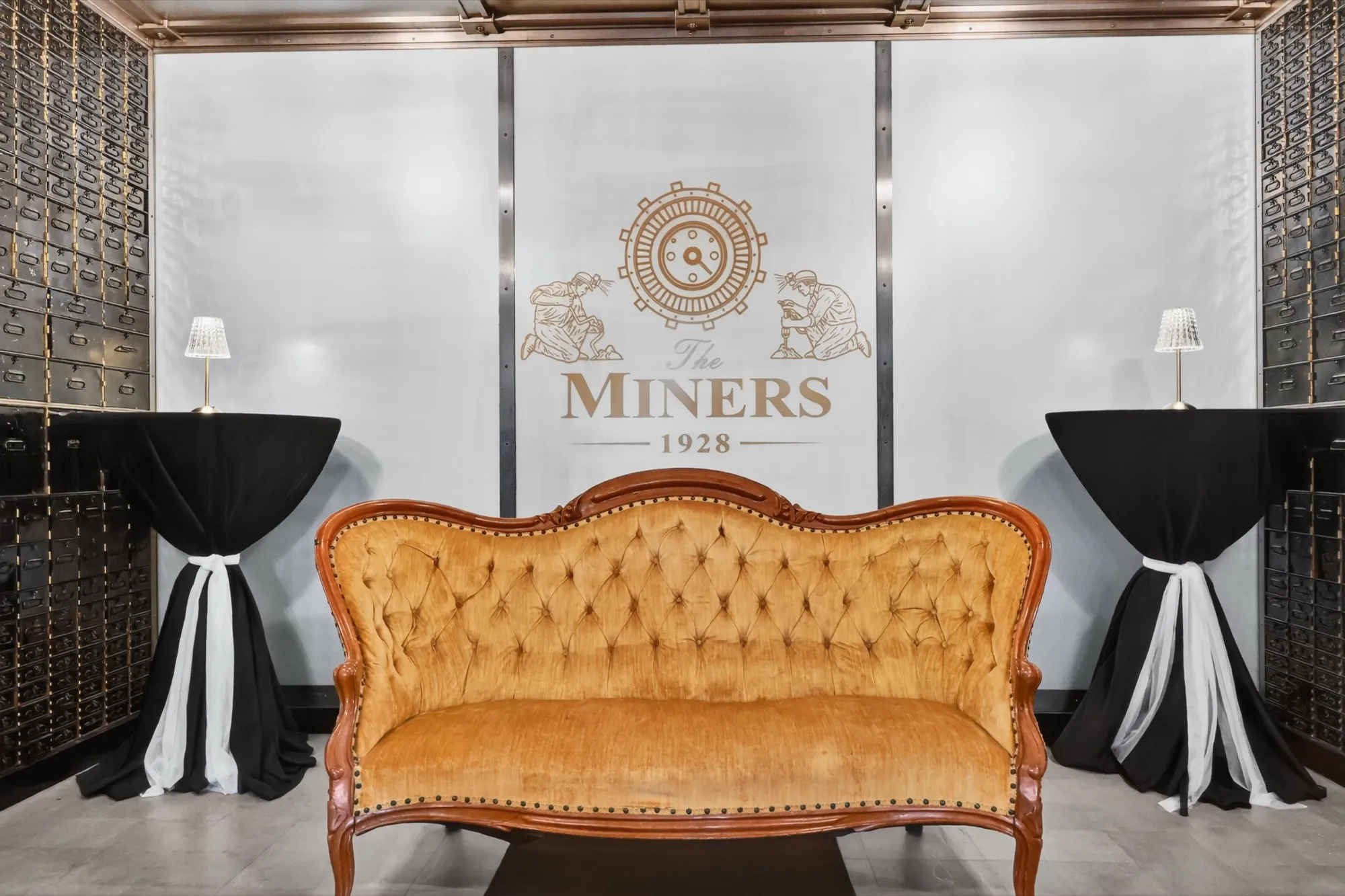 An elegant celebration setup in the gilded vault lounge at The Miners 1928
