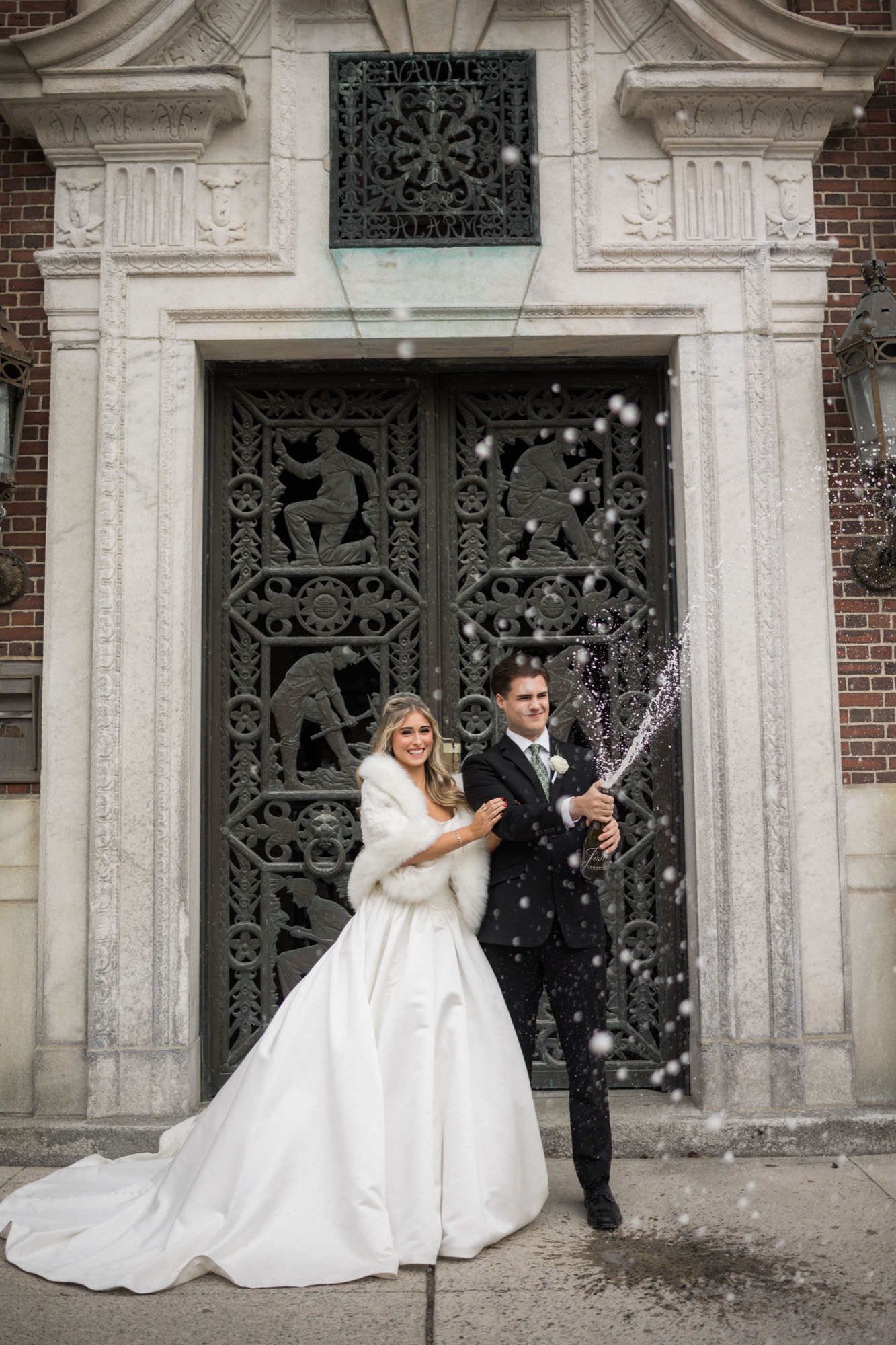 The monumental ten-foot brass Polachek entrance doors of The Miners 1928